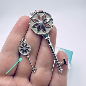 Tiffany & Co. Small Diamond Daisy Key Charm in Sterling Silver with Pouch